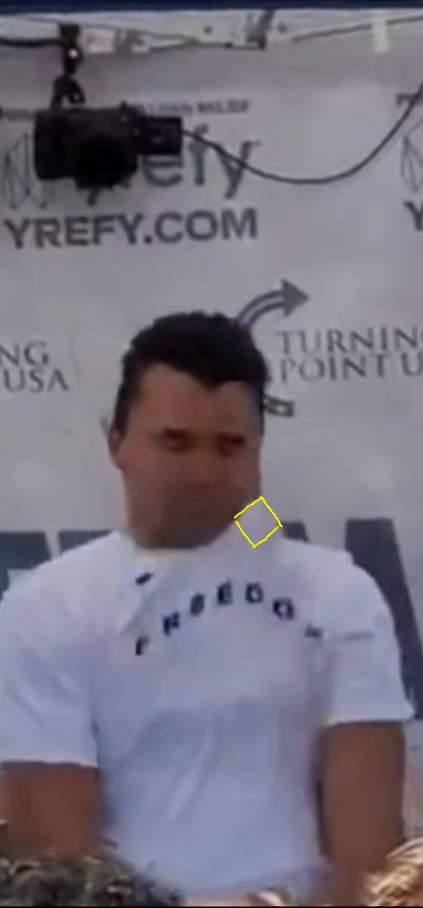 Circuit board shape outlined through shirt fabric